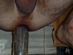 Gay man enjoying extreme solo pleasure with a dildo