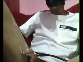 Young Asian man masturbates and cums hard.