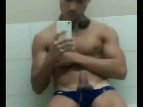 Hot Asian man masturbates by the pool
