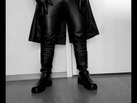 A young gay man in leather attire gets kinky.