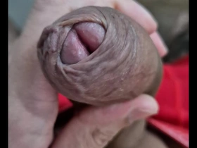 A young Brazilian man masturbates and shows off his big penis.