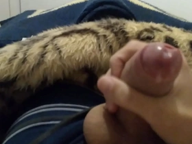 A young man with a big dick gives a solo pleasure performance.