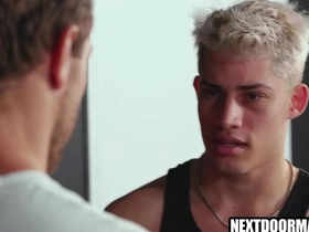 Muscular men engage in hot gay anal sex in the weight room.