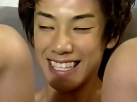 Gay Japanese guy gives blow job to his lover