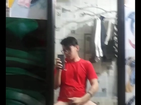 Solo Vietnamese gay masturbates in soccer clothes.