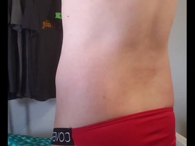Young gay guy in new underwear