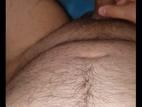 Young Asian boy pleasuring himself at home