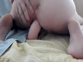 Gay newbie enjoys a dildo ride