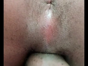 A young gay man has an orgasm and screams in pleasure while masturbating.