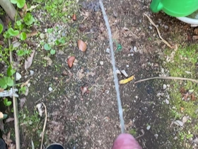 Solo boy urinates in the Asian garden on 10th April 2021.